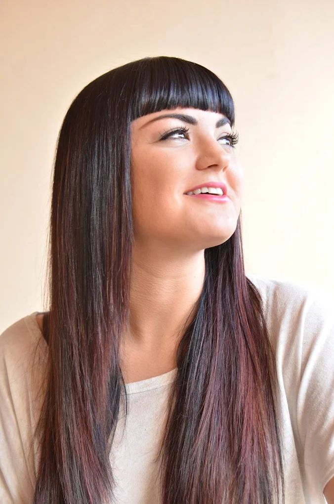 Glossy brunette hair color with subtle dimension